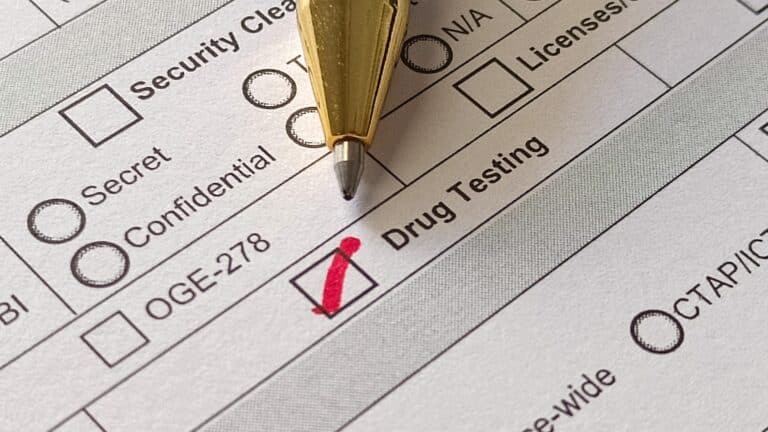 paperwork with drug testing marked