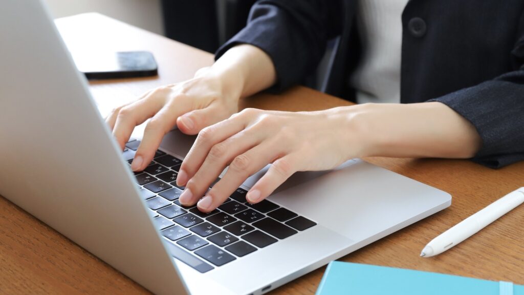 person investigating on laptop