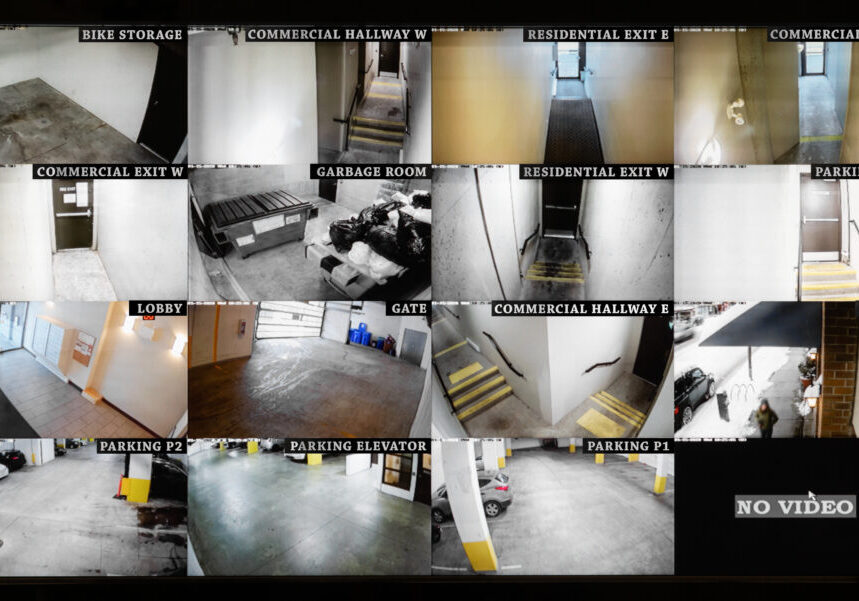Security camera monitoring screen. 16 camera slots. Small high end system of residential, commercial  or strata building. Parking, gate, garbage and recycling room, staircase and hallway.