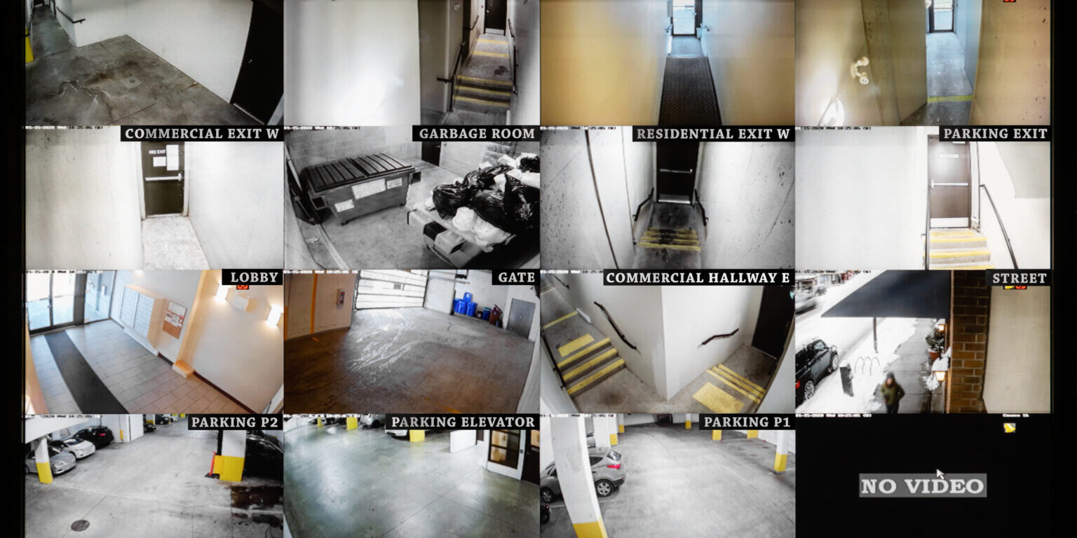 Security camera monitoring screen. 16 camera slots. Small high end system of residential, commercial  or strata building. Parking, gate, garbage and recycling room, staircase and hallway.